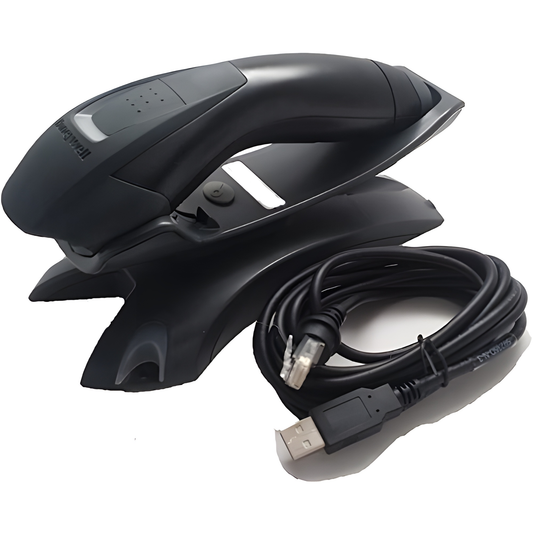 Honeywell Voyager 1202g — black scanner on its charge and communication base with USB cable