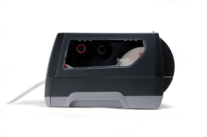 Honeywell PM65A industrial label printer, side media window showing loaded label roll
