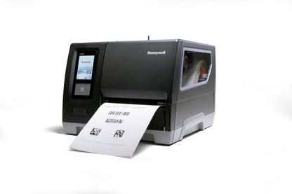 Honeywell PM65A industrial label printer producing a printed label