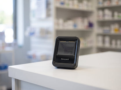 Honeywell Genesis XP 7680g hands-free presentation area imager in black on a retail checkout counter — AI-generated image
