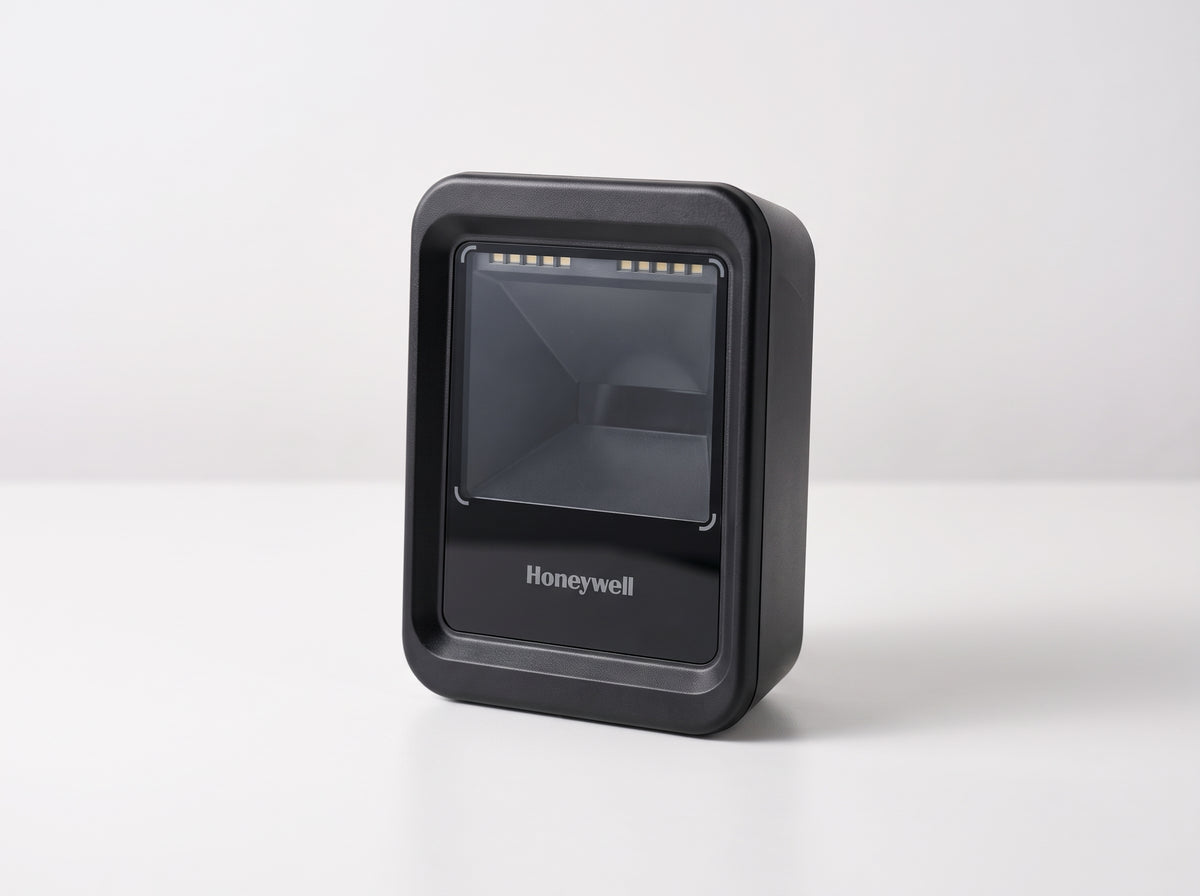 Honeywell Genesis XP 7680g hands-free presentation area imager in black on a cafe counter — AI-generated image