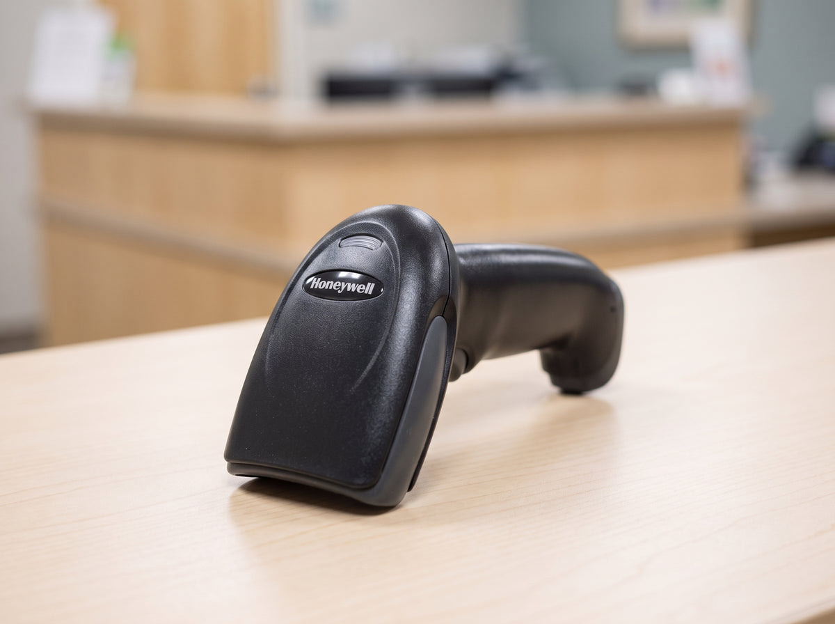 Honeywell Hyperion 1300g corded 1D linear imaging barcode scanner in black on a pharmacy counter — AI-generated image