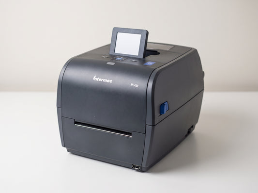 Honeywell PC43t desktop thermal transfer label printer, front view with colour LCD — AI-generated image
