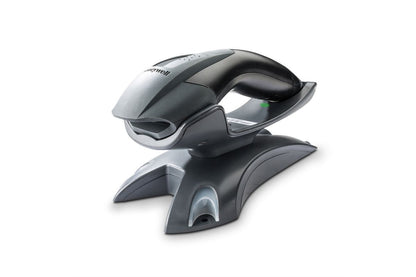 Honeywell Voyager 1202g — scanner seated in its charge and communication base