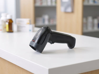 Honeywell Voyager 1250g corded 1D laser barcode scanner in black on a retail checkout counter — AI-generated image