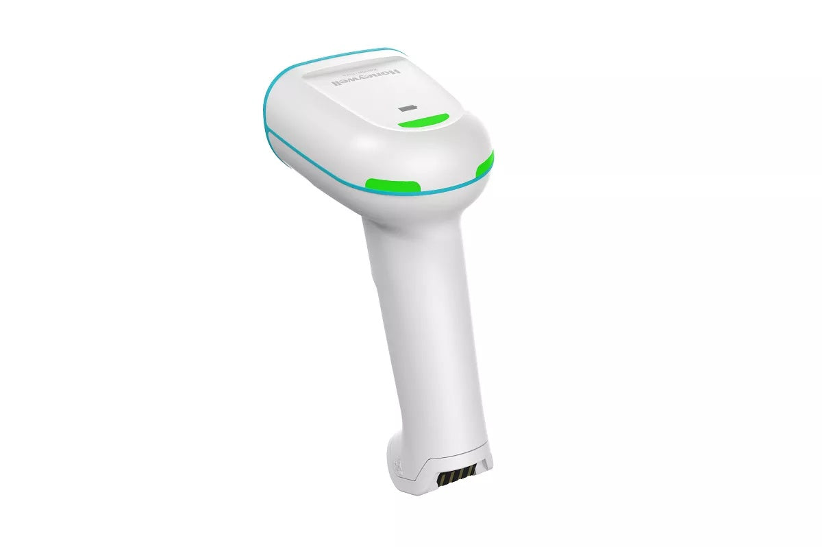 Honeywell Xenon Ultra 1962h — white healthcare scanner in its contact charging base