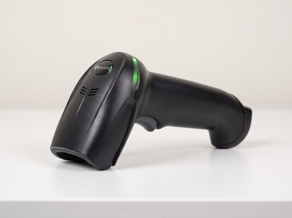 Honeywell Xenon XP 1950g corded 1D/2D barcode scanner in black on a cafe counter — AI-generated image