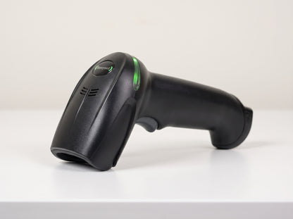 Honeywell Xenon XP 1950g corded 1D/2D barcode scanner in black on a cafe counter — AI-generated image
