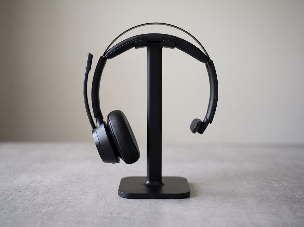 Poly Voyager Focus 2 headset resting on its charge stand — AI-generated image