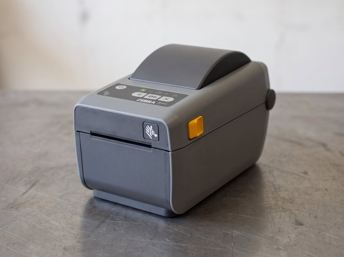 Zebra ZD411 2-inch direct thermal desktop label printer, front three-quarter view of the control panel — AI-generated image