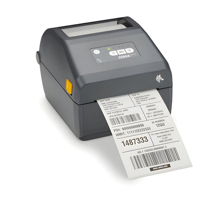 Zebra ZD421d direct thermal desktop label printer — right side view with a printed label emerging