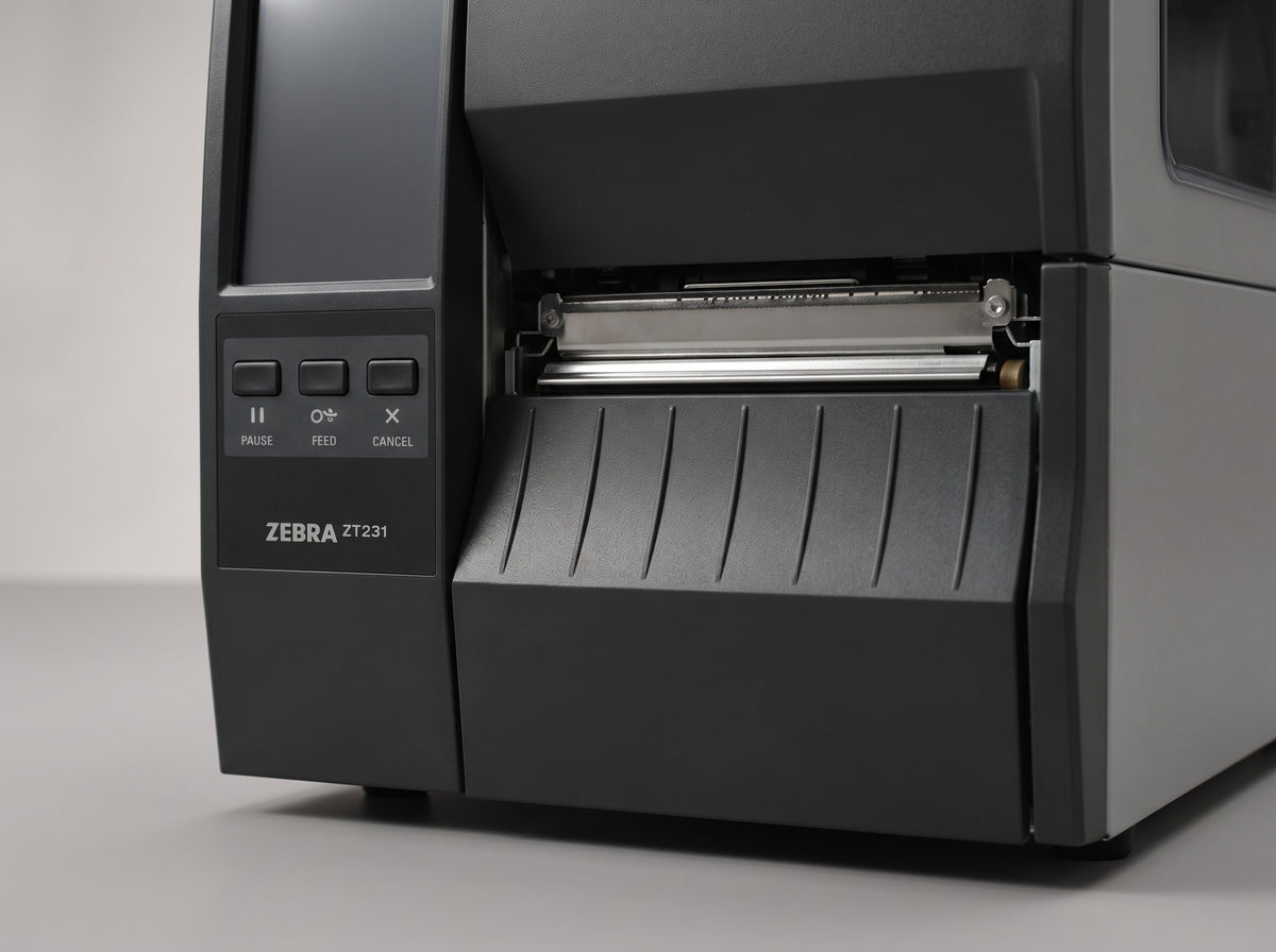 Zebra ZT231 industrial label printer, low front view of the media door and tear-off edge — AI-generated image